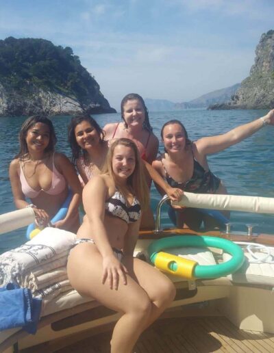 happy friends during a boat tour